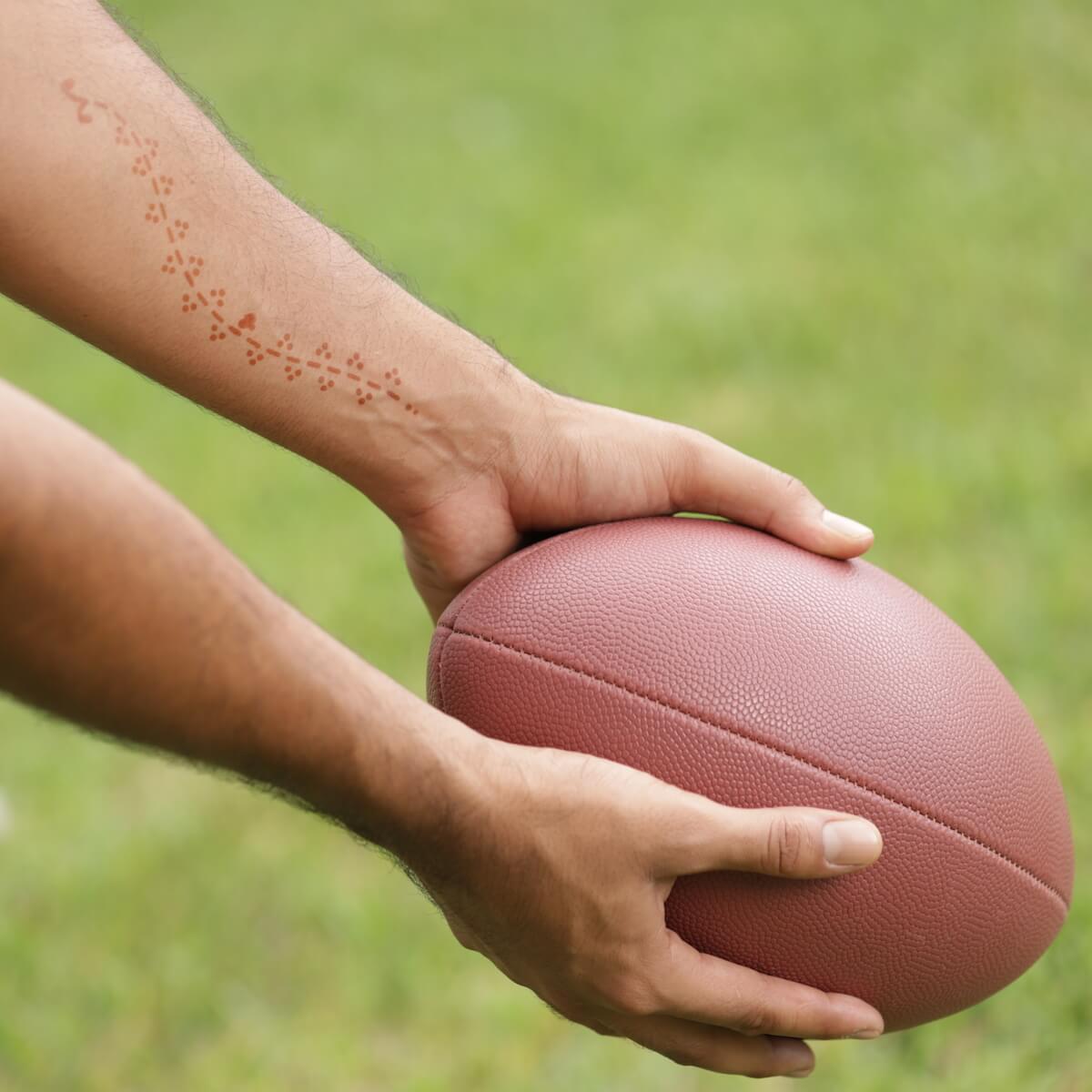 Jade - wrist henna design and football