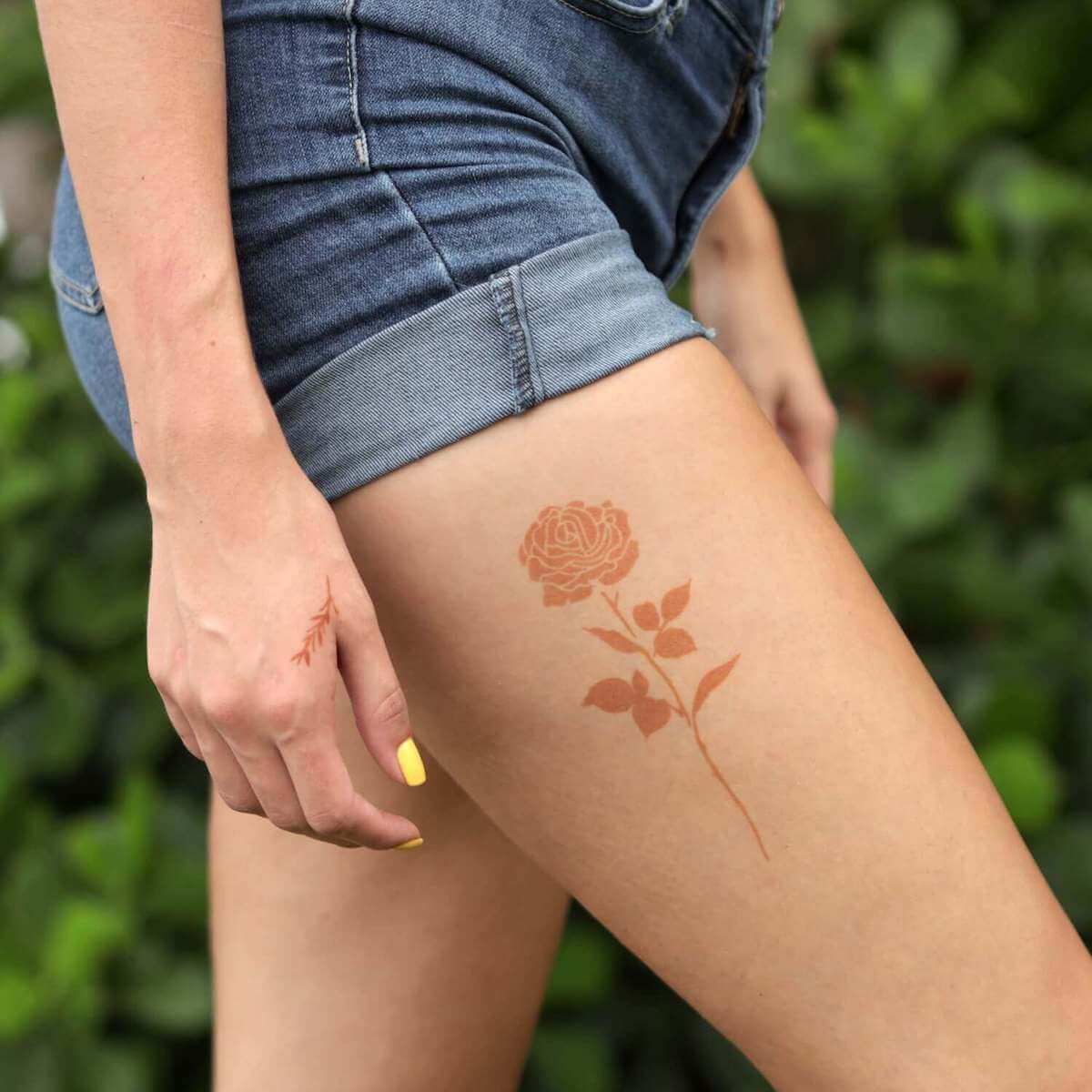Rose - floral henna tattoo on thigh
