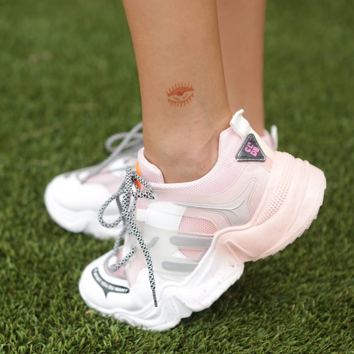 Yang - mini evil eye henna tattoos on ankle