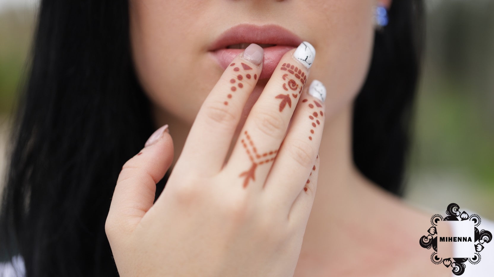 Henna jewelry - ring designs on woman's hand by Mihenna