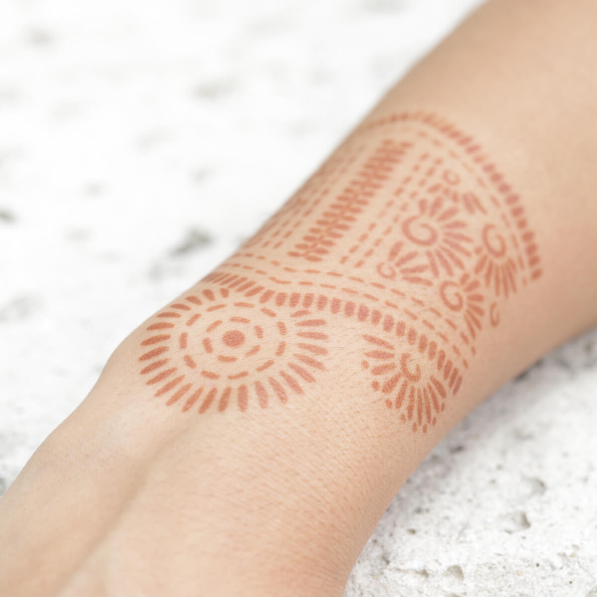 Aphrodite - close up of bangle henna design on wrist