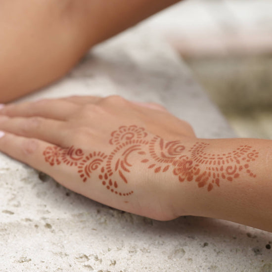 Athena - close up of wrist henna design