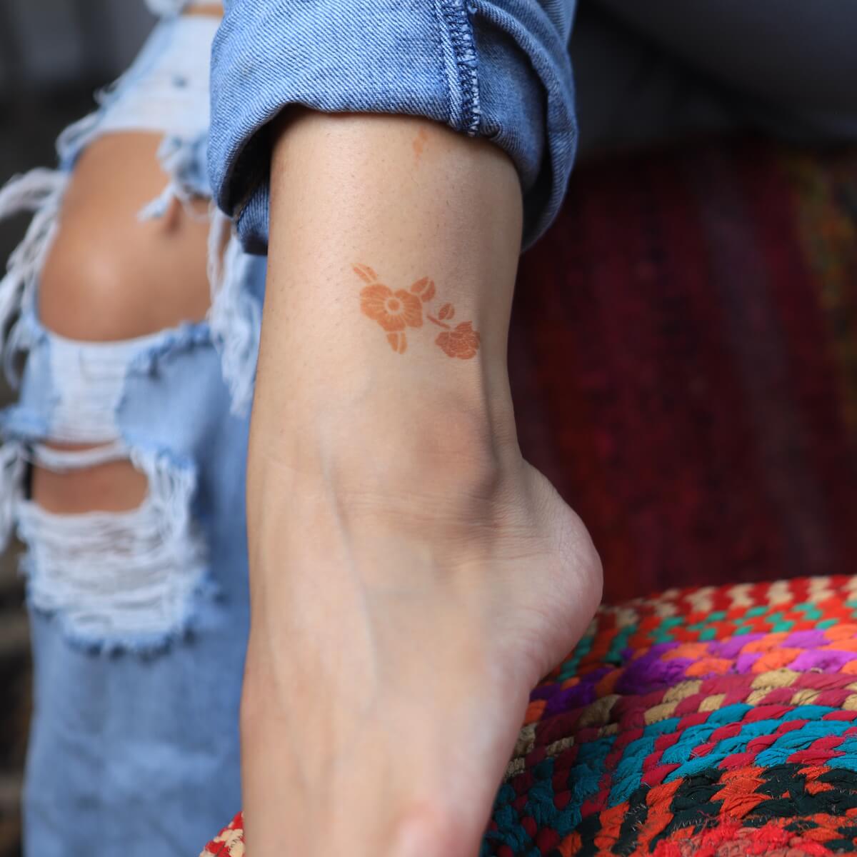 Azalea - single flower henna design on ankle