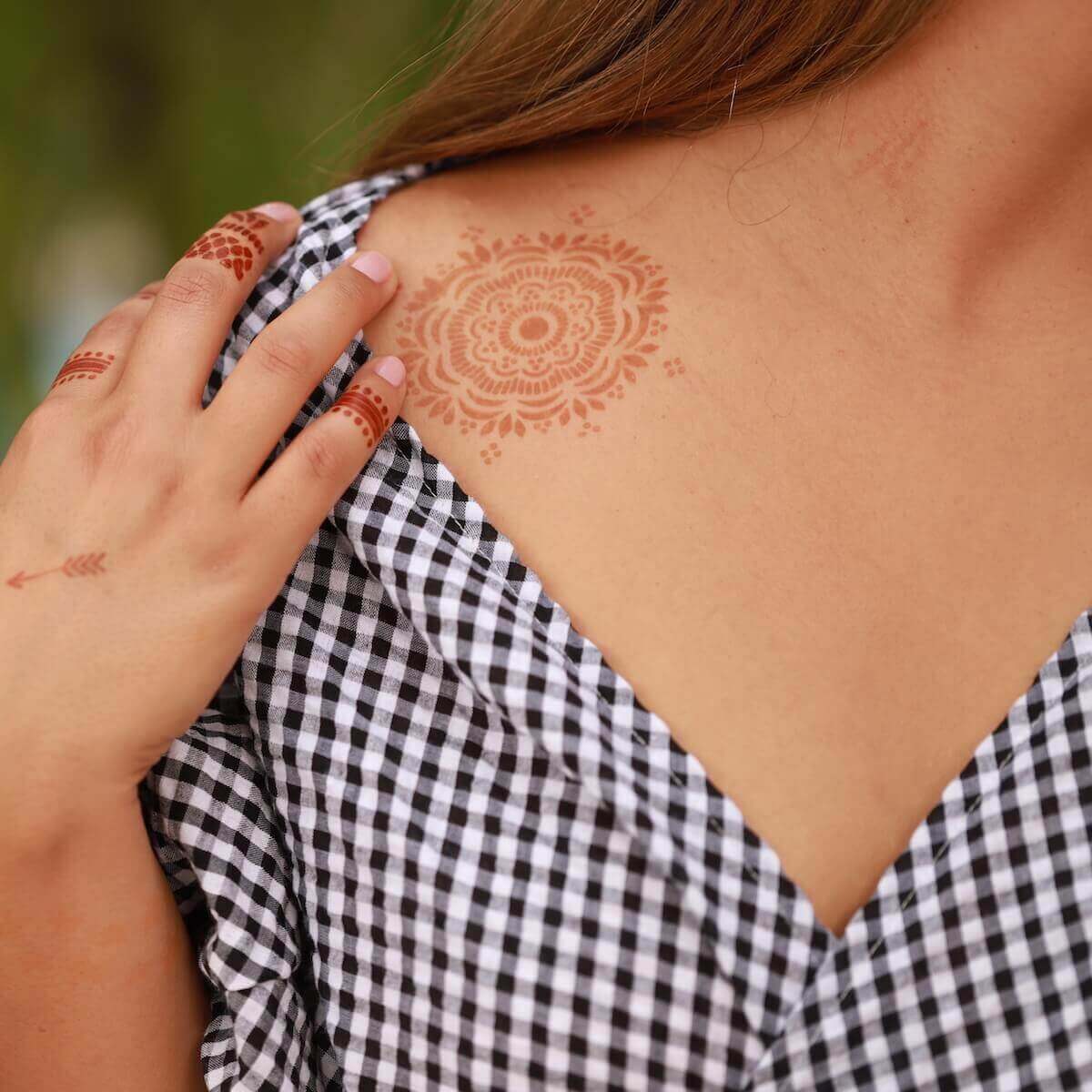 Blossom - mandala henna design on shoulder