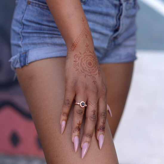 Camellia - woman with henna tattoo on the back of her hand