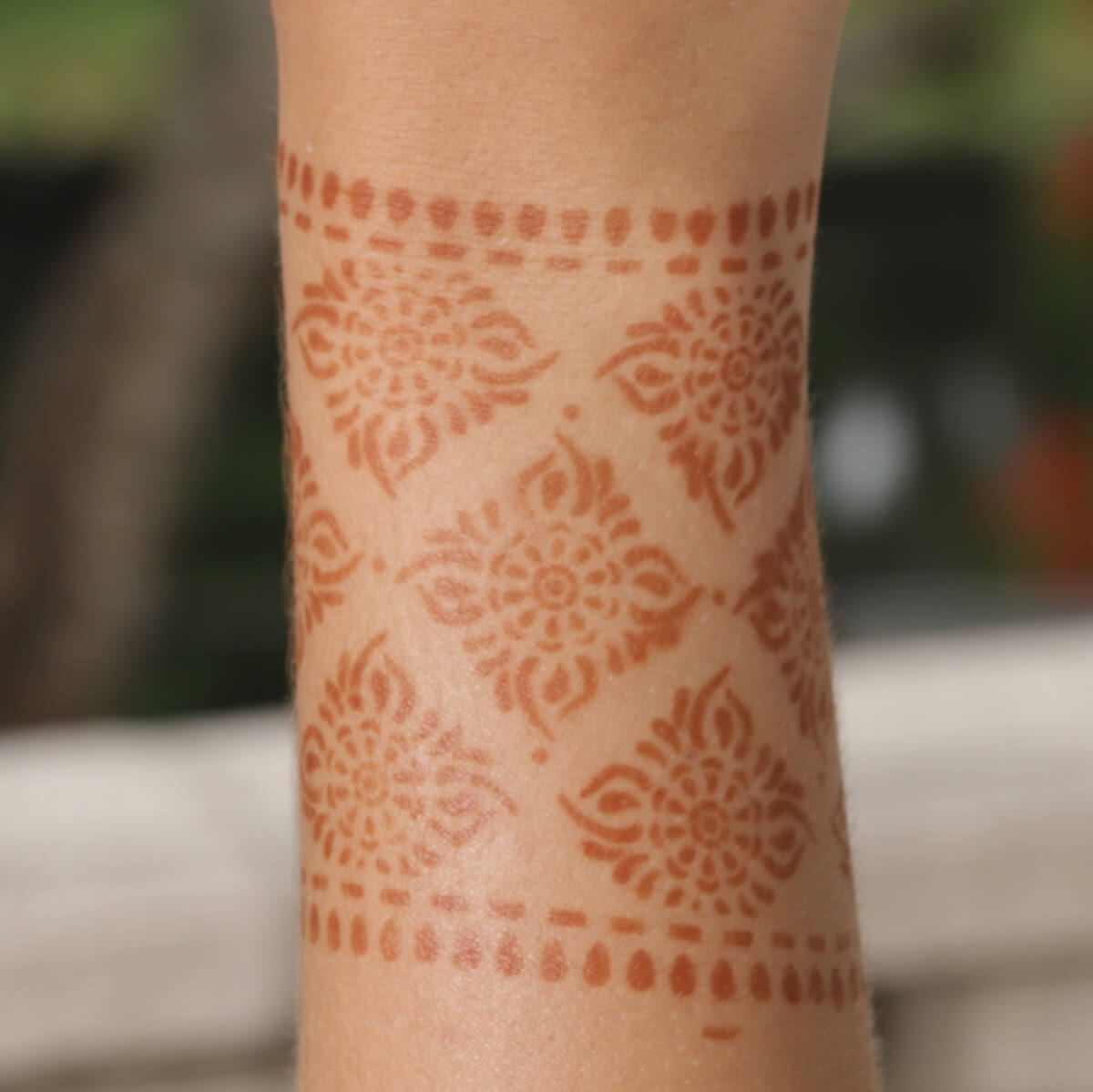 Courage - bangle henna design on wrist