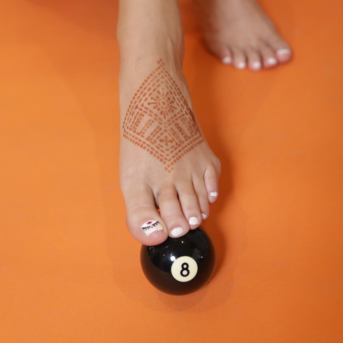 Fauzie - geometric henna design on foot
