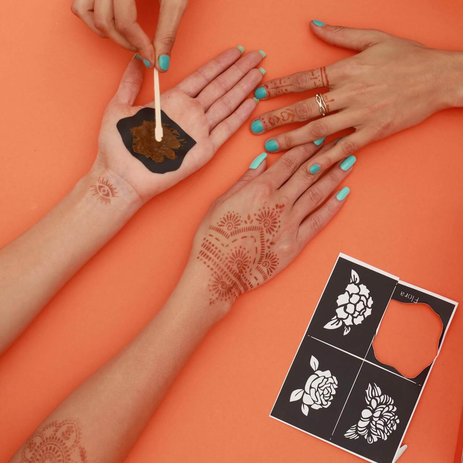 Flora Henna Stencil - using Mihenna stencil to create a flower henna design on palm