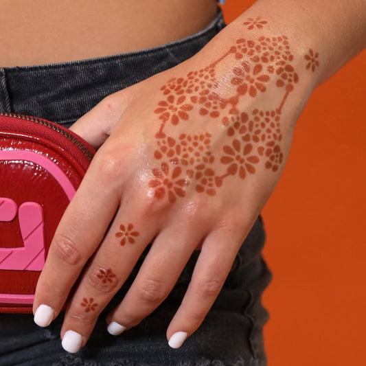 Flower Power - floral henna tattoo on back of hand