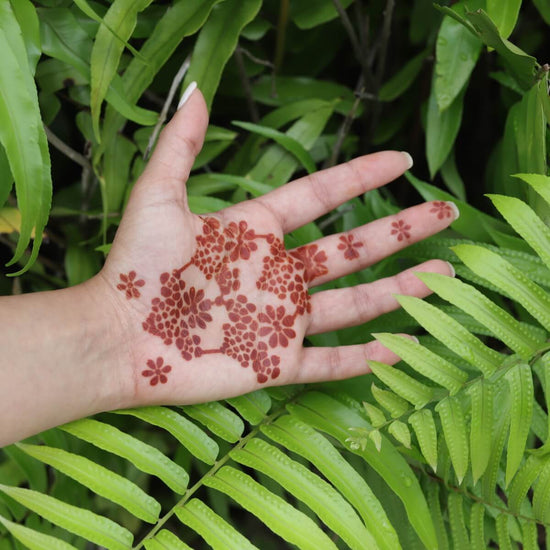 Flower Power - floral henna design on palm