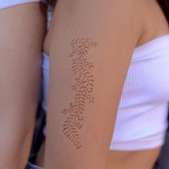 Ivy - floral henna tattoo on upper arm