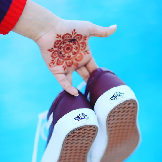 Passion Fruit - mandala henna design on palm