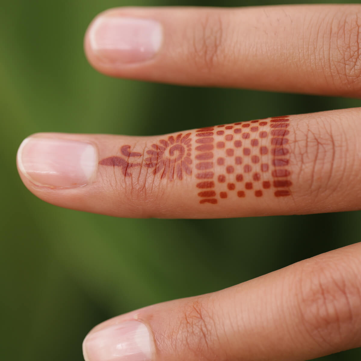 Radiant - ring henna tattoo on finger