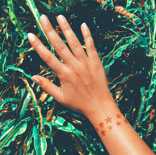 Stellar - star pattern henna design on wrist