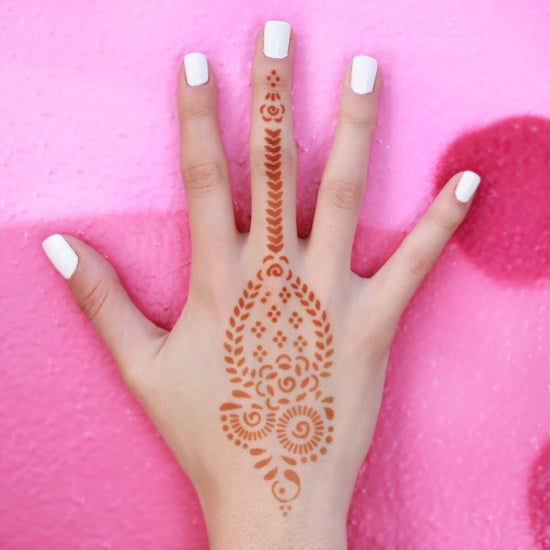 Marah - back of hand henna tattoo