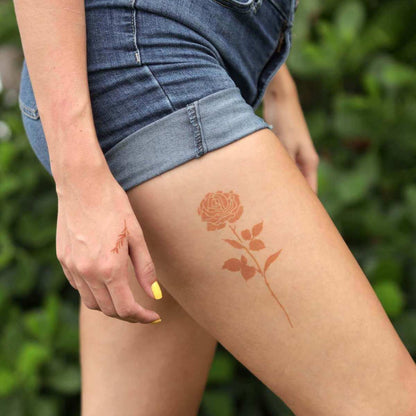 Rose - floral henna tattoo on thigh 