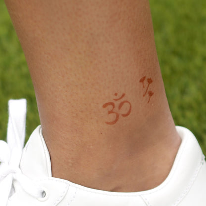 Yang - mini henna tattoos on ankle