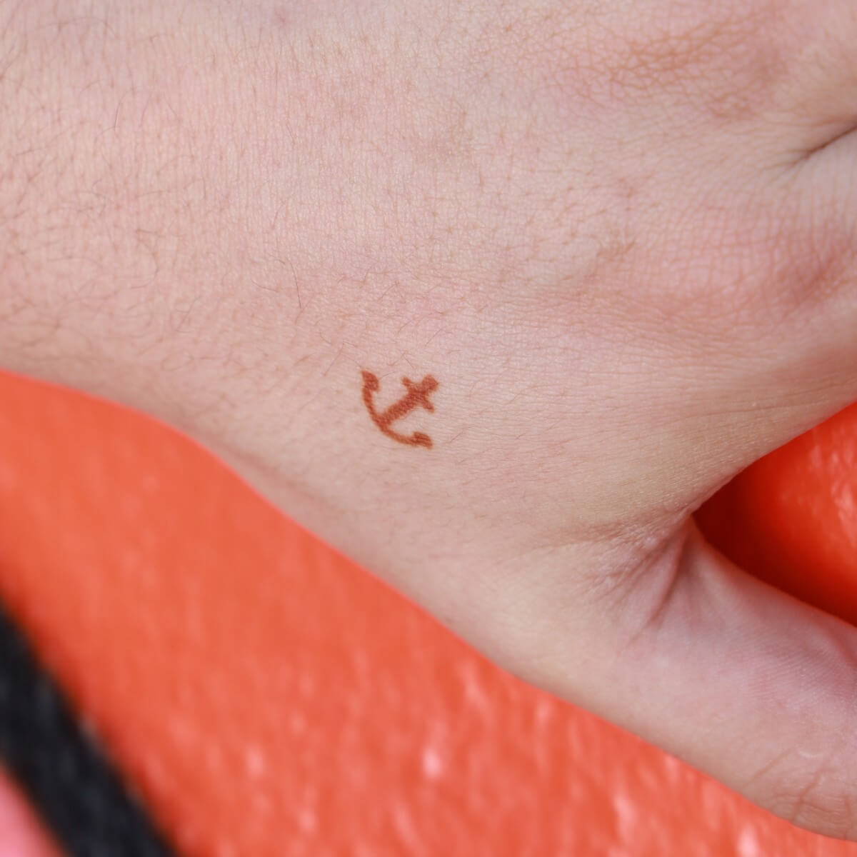 Ying - anchor mini henna tattoo on hand