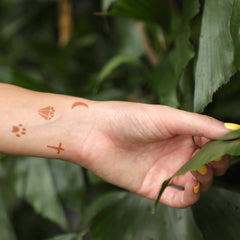 Yin - mini henna tattoos on wrist